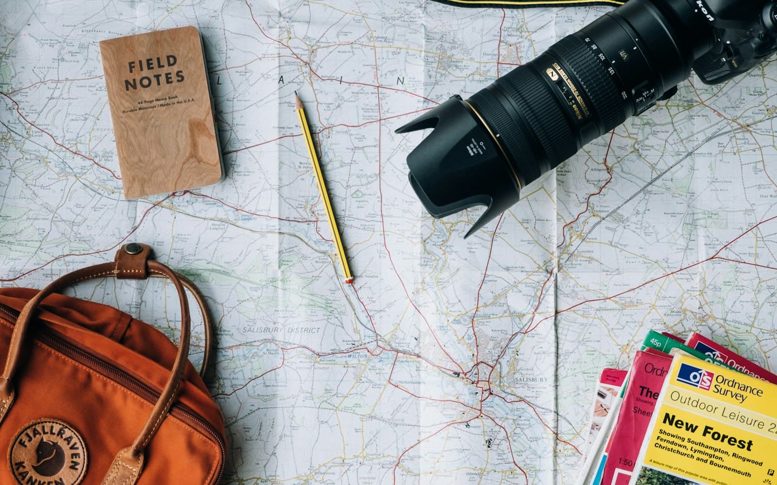 An organized open carry-on bag packed for a family trip