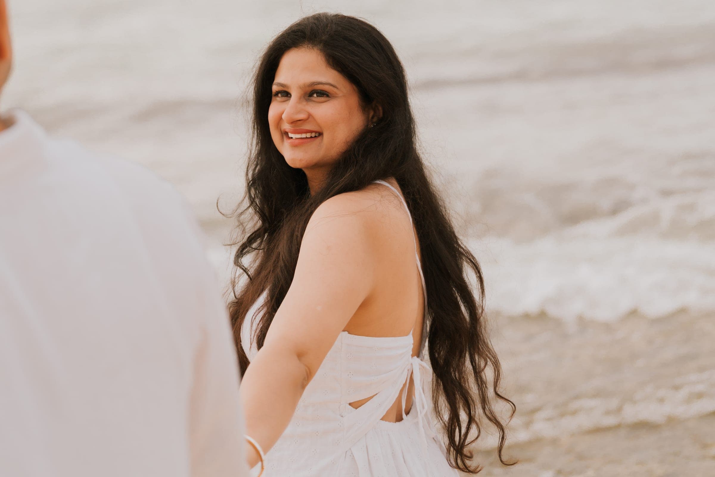 Heena on the beach at golden hour